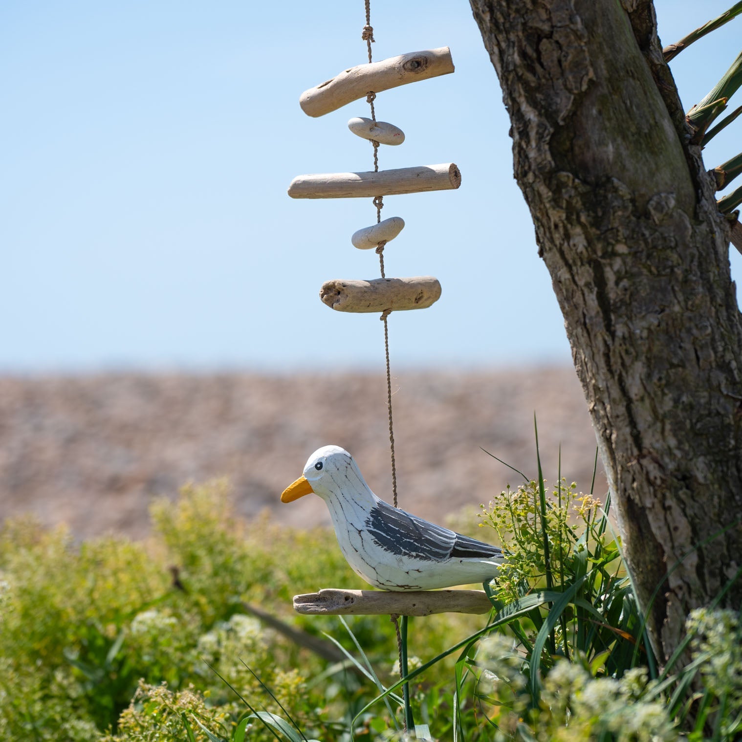 Hanging Seagull with Driftwood and Pebbles