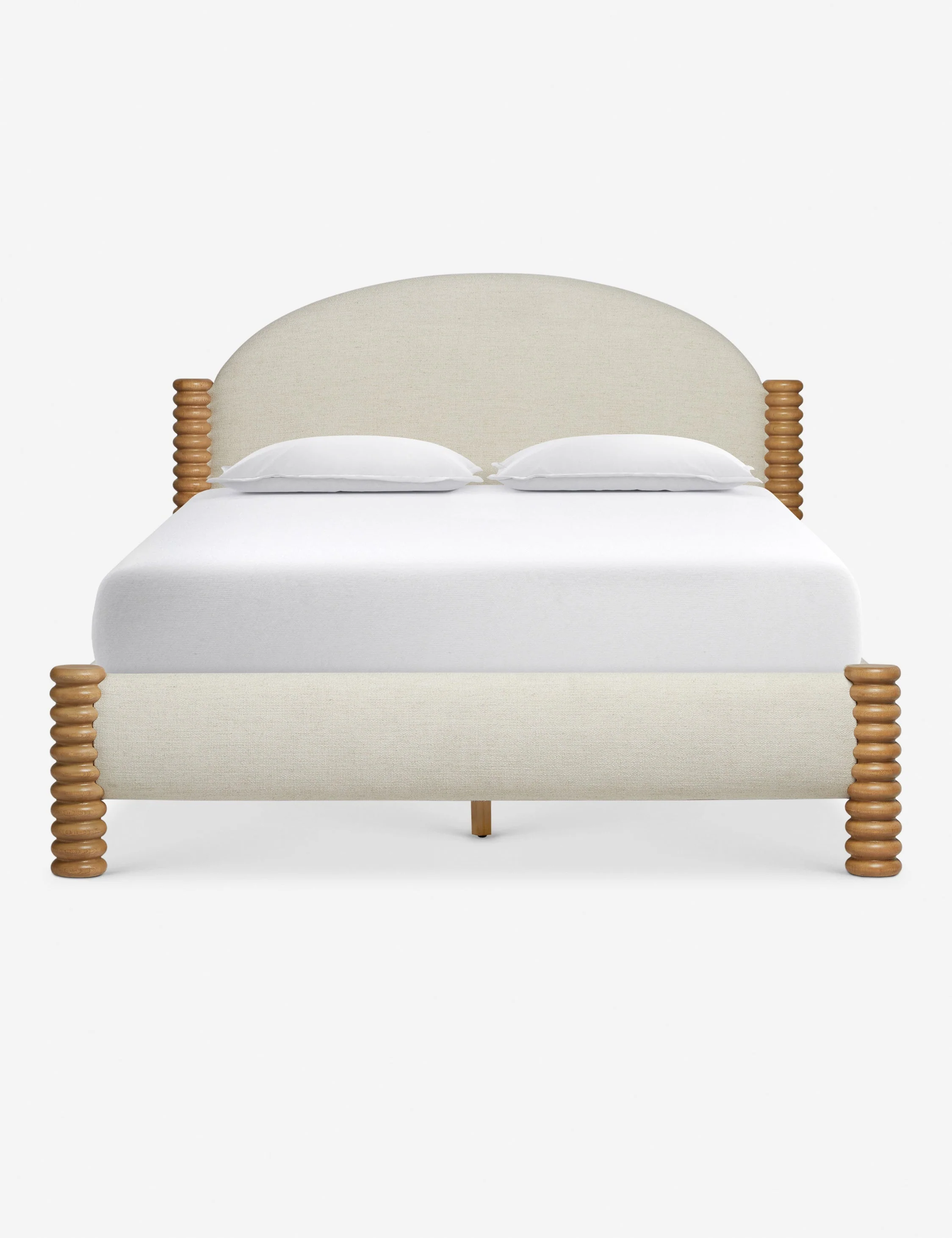 Bed - An arched headboard and turned wood legs give our bed a playful yet sophisticated presence