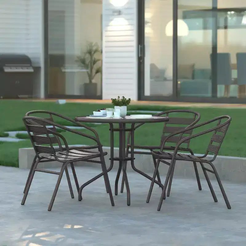 Emma and Oliver 31.5'' Round Glass Top Metal Table with 4 Aluminum Slat Stack Chairs