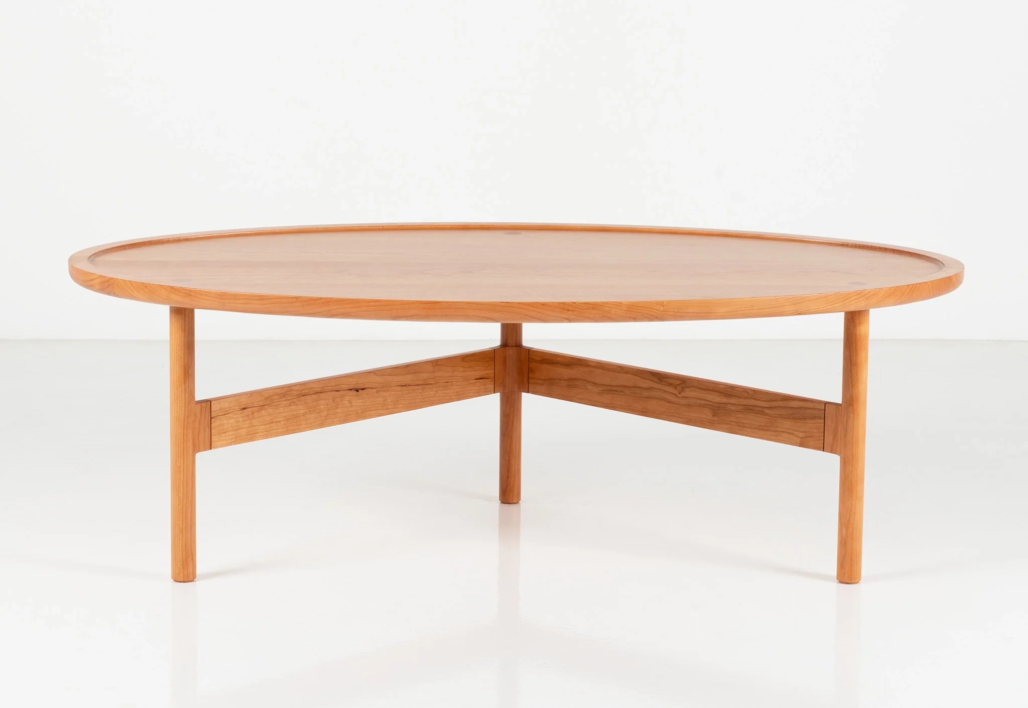 Coffee Table - The borrows its simplicity from traditional designs, and its light, contemporary profile from minimalism