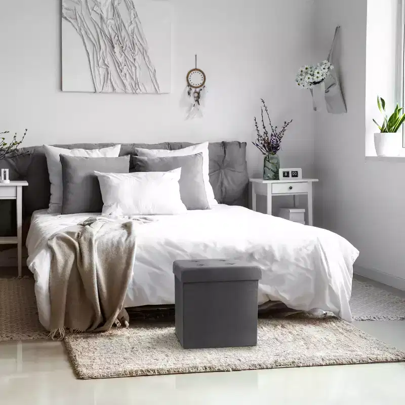 Seat & Declutter! Plush cushion, hidden storage, lightweight & portable. Folds flat