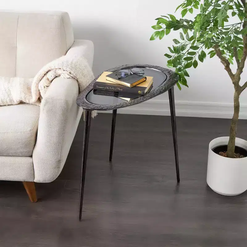 Olivia & May Aluminum Abstract Oval Shaped End Table with Shaded Glass Top Black